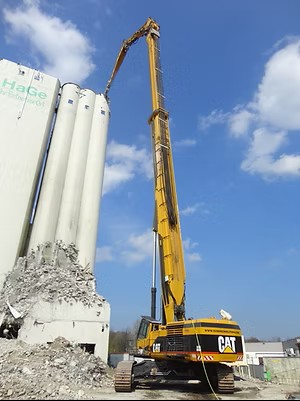 CAT 5110B - Sloopgraafmachine in actie